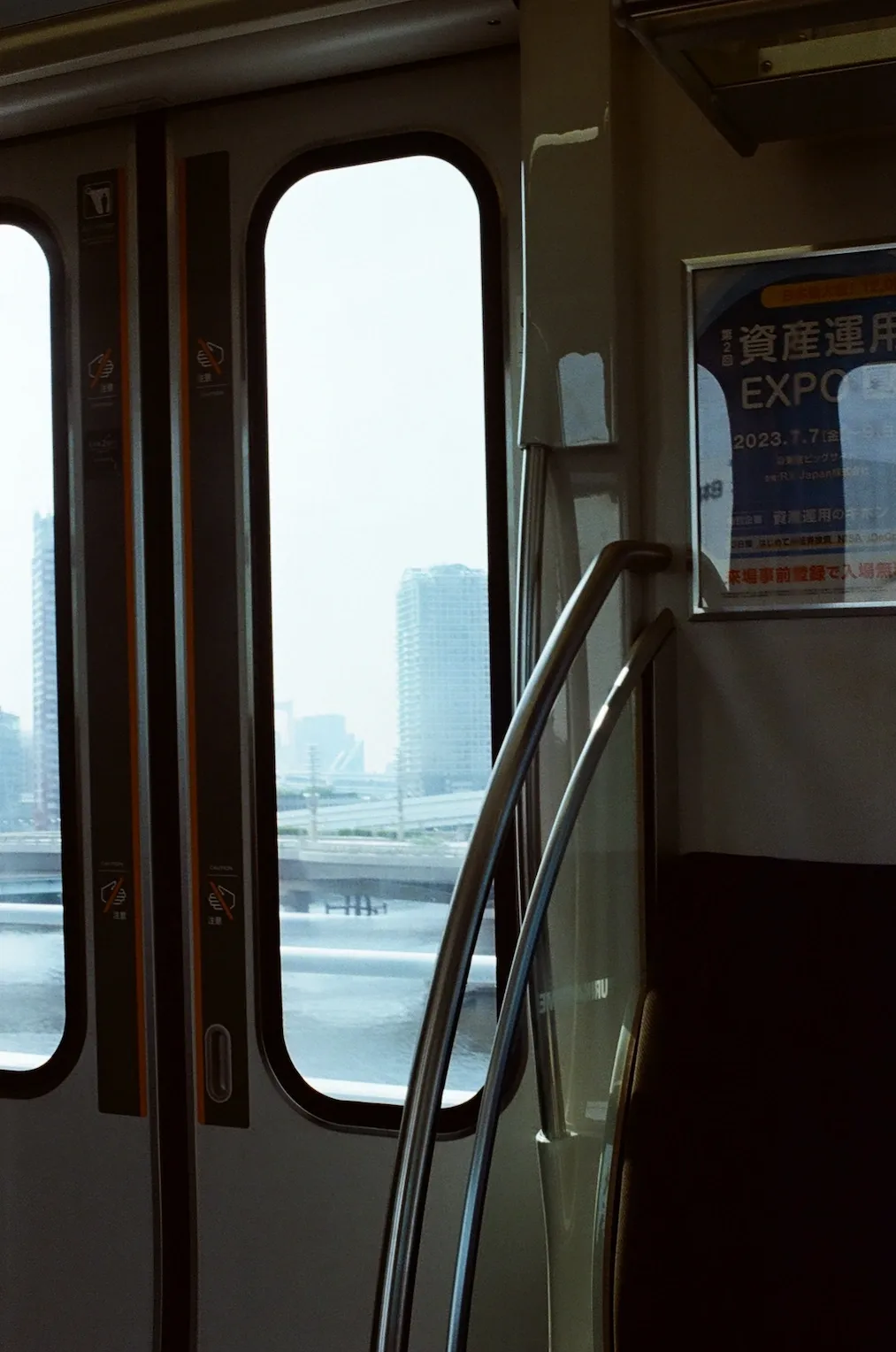 The squeaky clean door of a train in Tokyo.