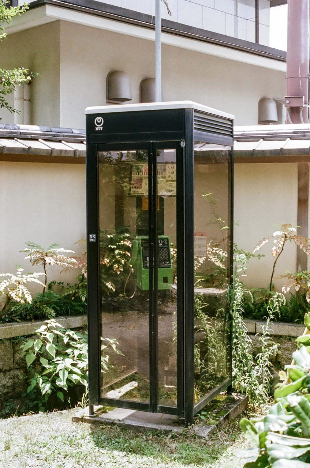 A retro-looking payphone.